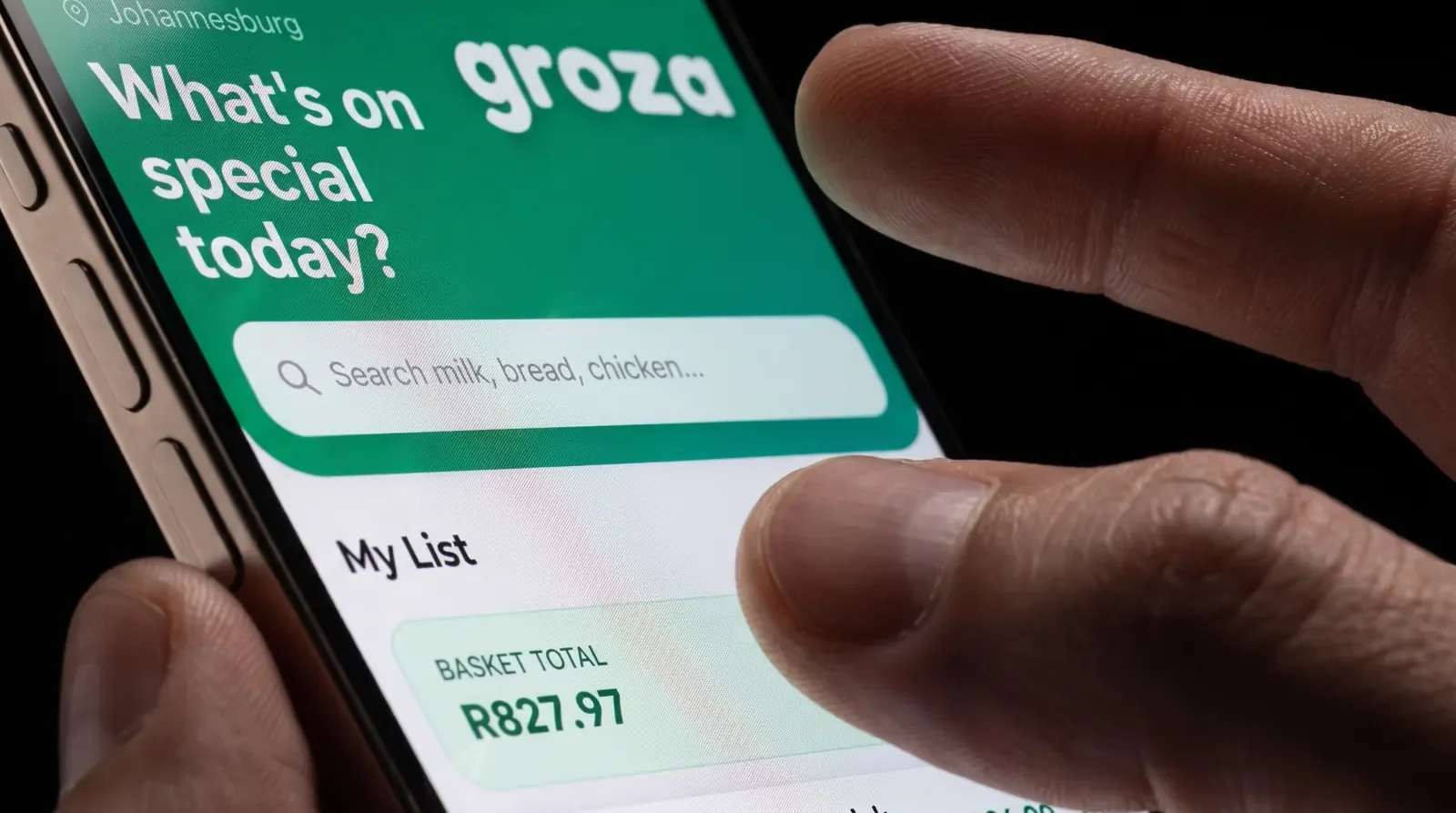 A shopper opening the Groza app on the specials search screen